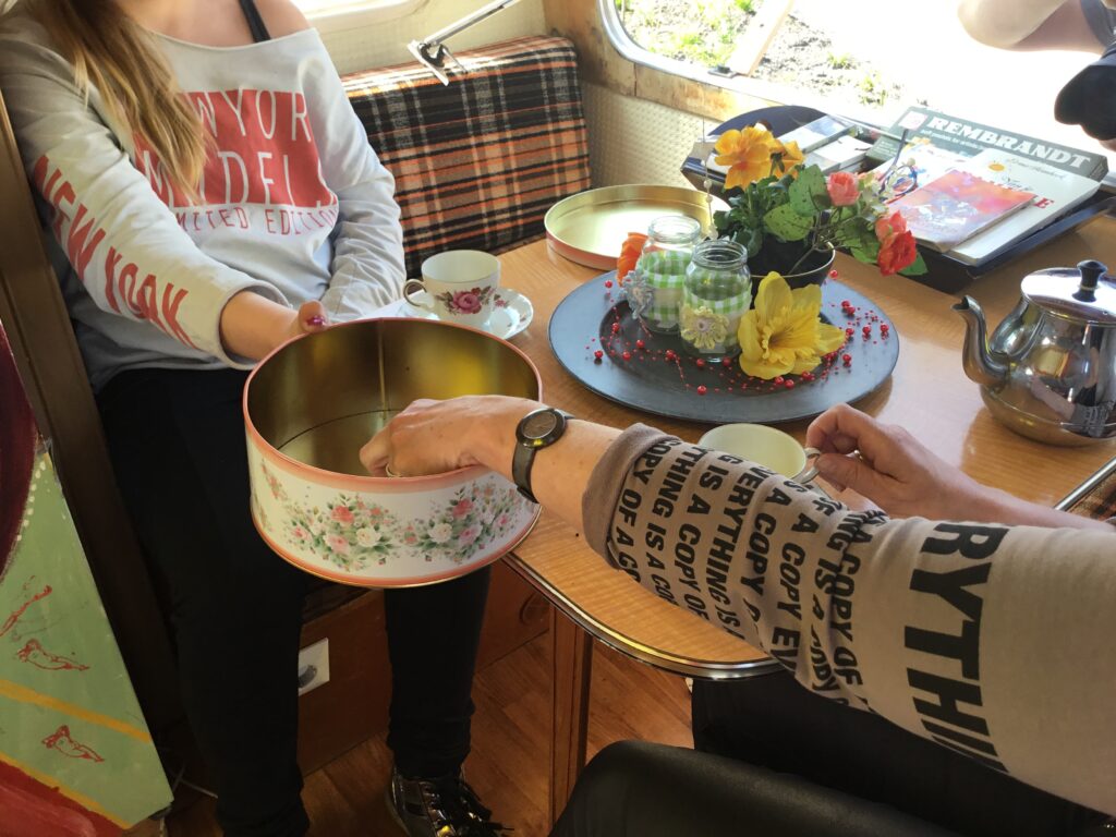 Detail view of the decorated caravan interior, where Everdina and Nellie come to life through objects and imagination